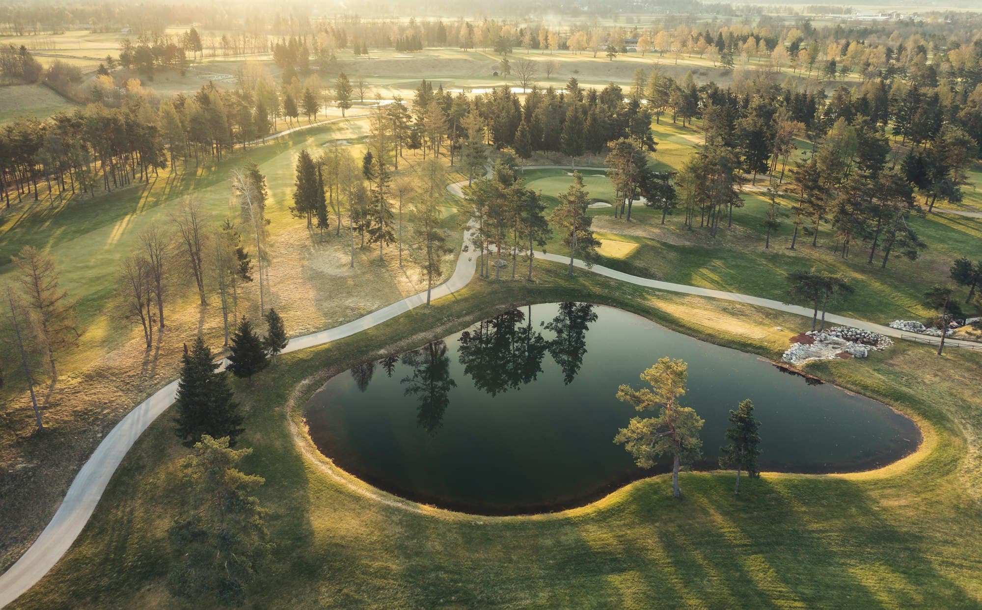 Sunrise light across a fairway at Greenway Pines.